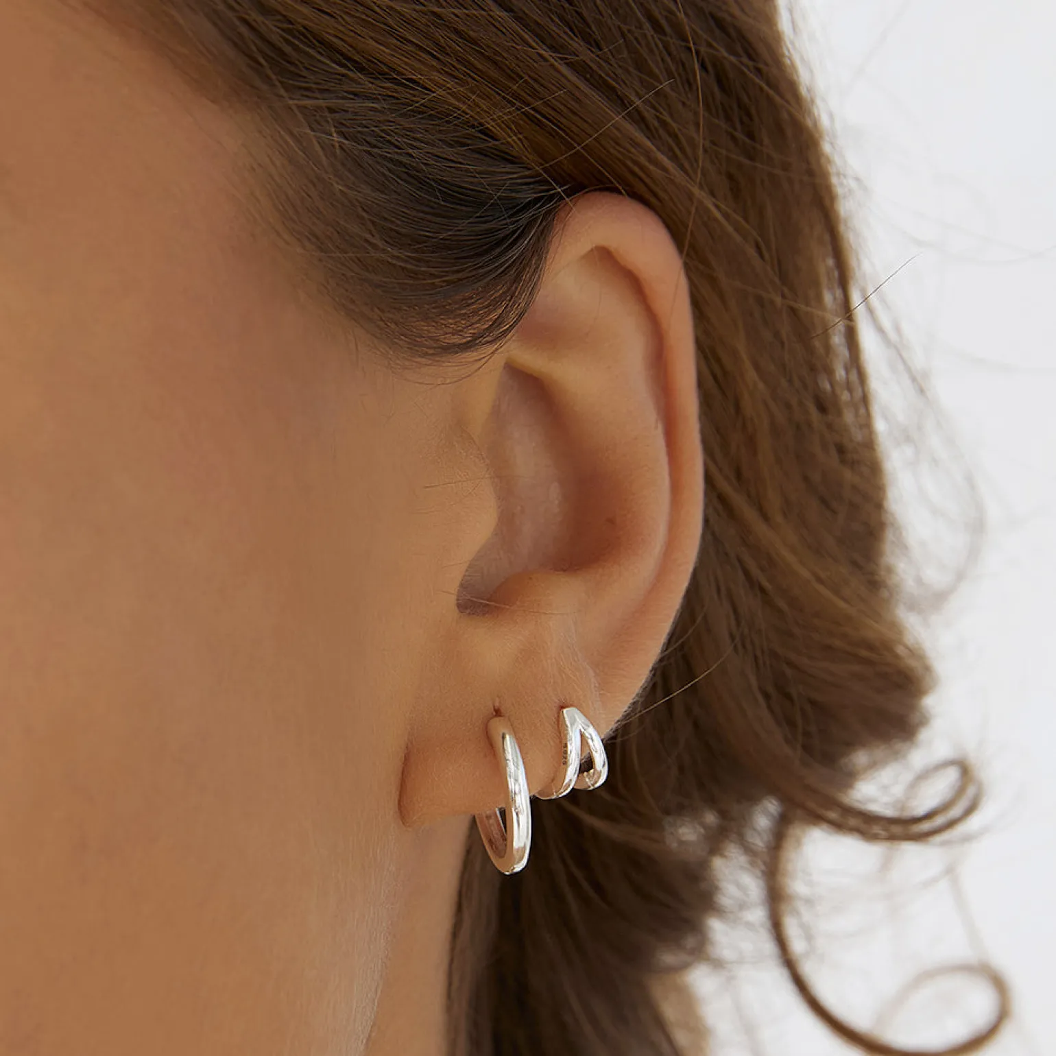 Jean Silver Huggie Earrings